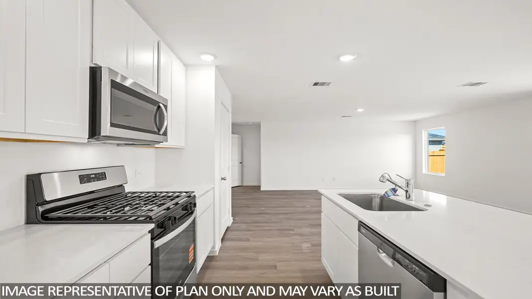 Representative furnished interior of a home built from the Callahan by D.R. Horton in Sunterra Lakes, Brookshire (Image 4).