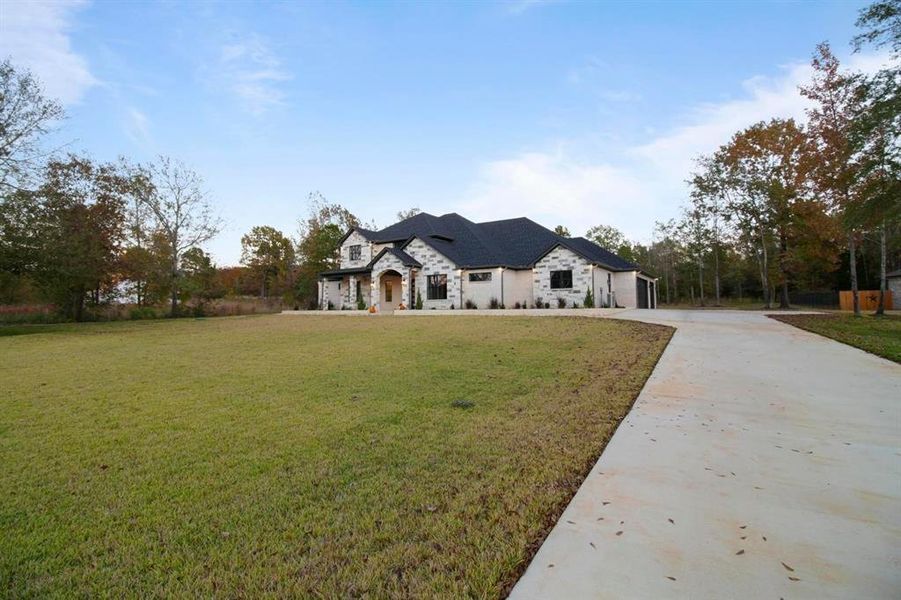 Front exterior of a new home in , Bullard, TX, highlighting curb appeal (Image 22).