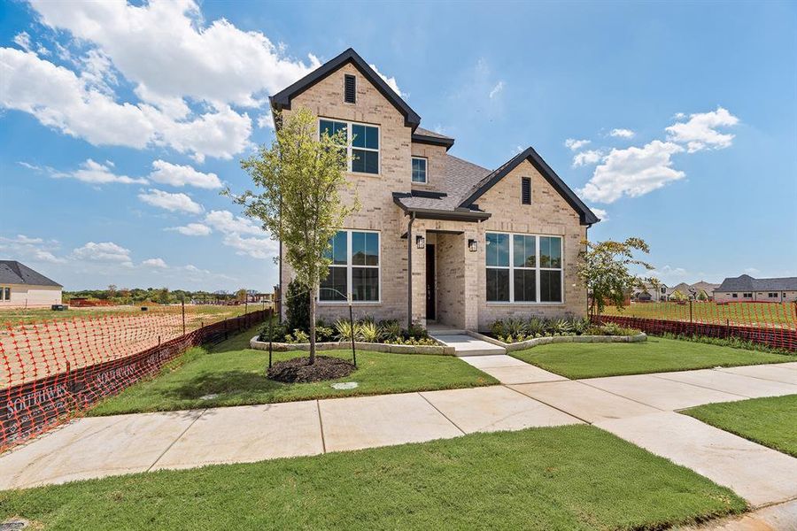 Traditional home featuring brick siding Traditional home featuring brick siding