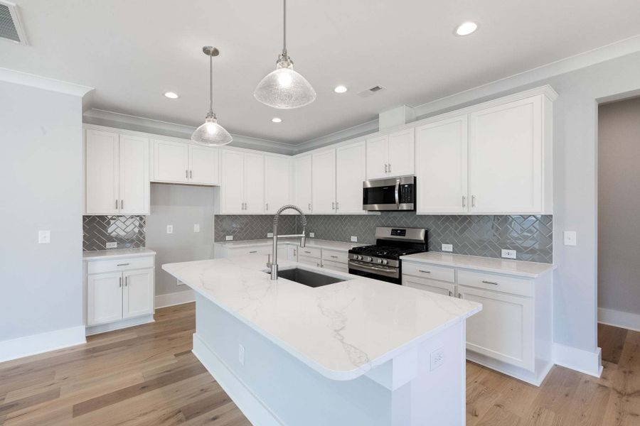 Representative furnished interior of a home built from the Austin by Caviness & Cates Communities in Bartlett Manor, Youngsville (Image 111).