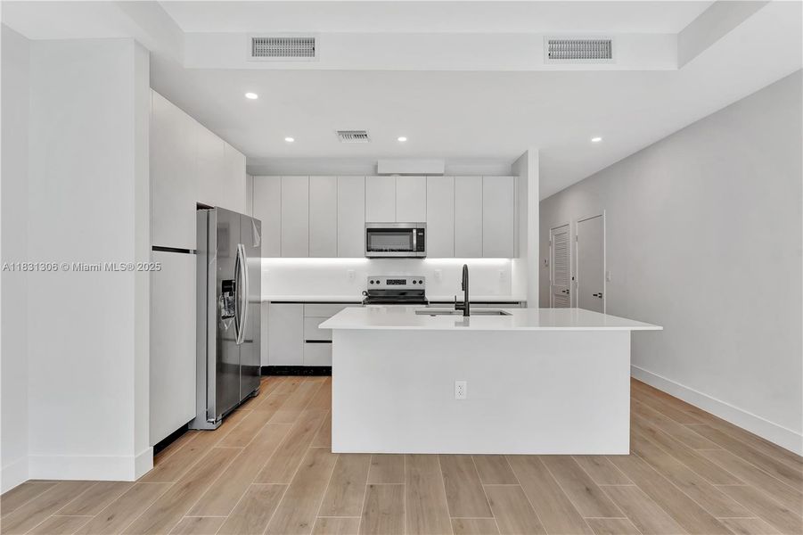 Furnished interior view inside a new home in , Coral Springs (Image 6).