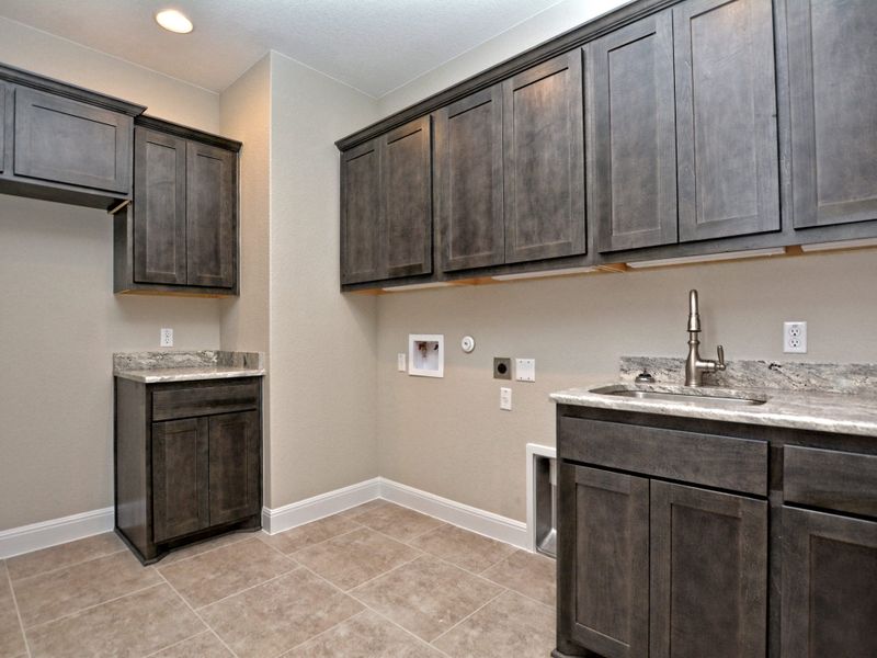 Representative furnished interior of a home built from the Santa Barbara II by Giddens Homes in Scofield Farms Estates, Georgetown (Image 8).