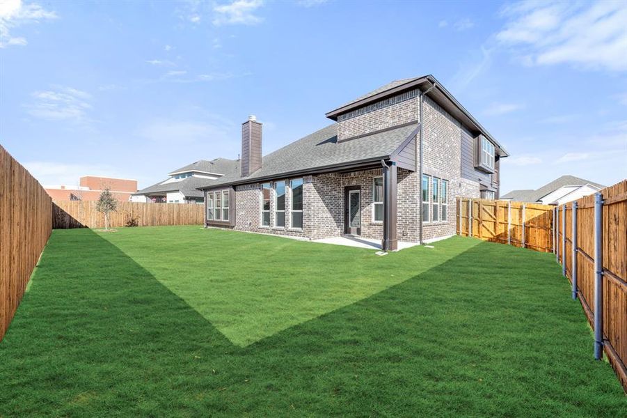Exterior details and patio area of a home in West Crossing, Anna (Image 27).