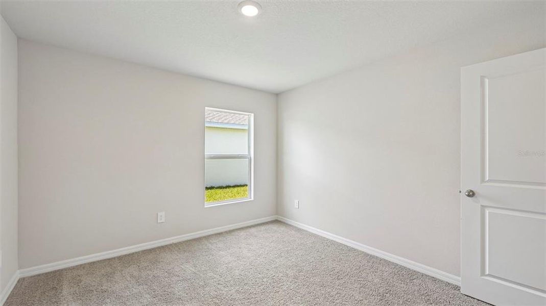 Spacious, unfurnished interior of a new home in Rye Crossing, Parrish (Image 25).