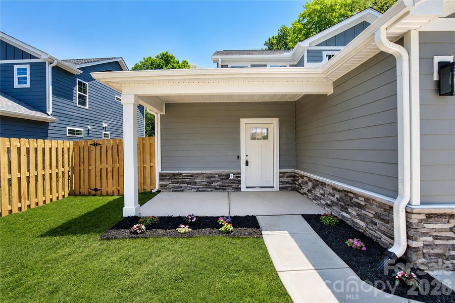 Exterior details and patio area of a home in , Huntersville (Image 26).