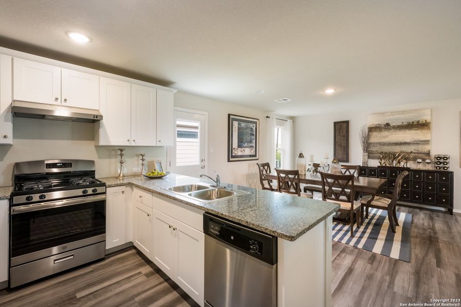 Furnished interior view inside a new home in Navarro Ranch: Cottage Collection, Seguin (Image 5). Furnished interior view inside a new home in Navarro Ranch: Cottage Collection, Seguin (Image 5).