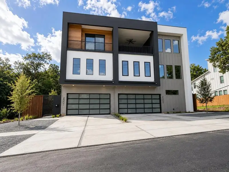 Front exterior of a new home in , Dallas, TX, highlighting curb appeal (Image 1). Front exterior of a new home in , Dallas, TX, highlighting curb appeal (Image 1).