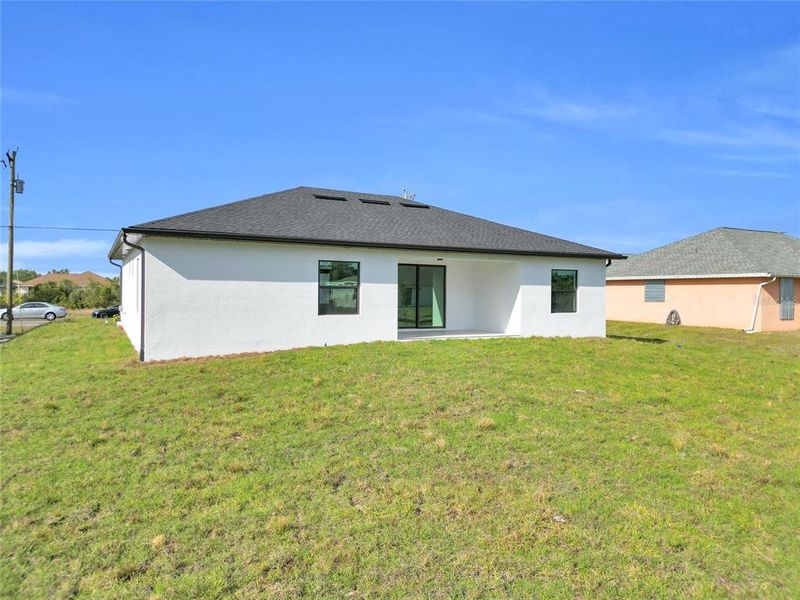Exterior details and patio area of a home in , Lehigh Acres (Image 23). Exterior details and patio area of a home in , Lehigh Acres (Image 23).