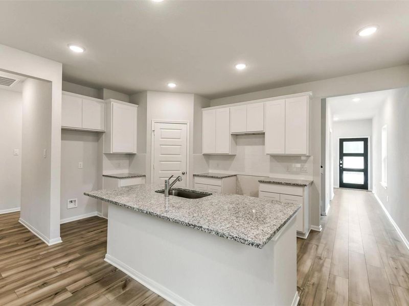 Furnished interior view inside a new home in Caney Creek Place, Conroe (Image 6).