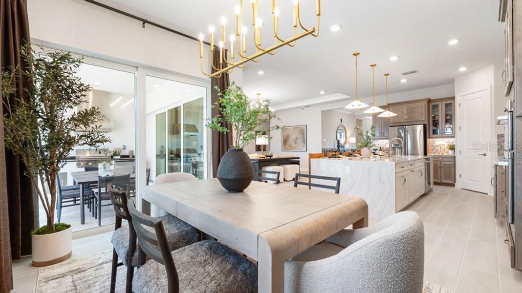 Furnished interior view inside a new home in Esplanade at Wellen Park, Englewood (Image 10).
