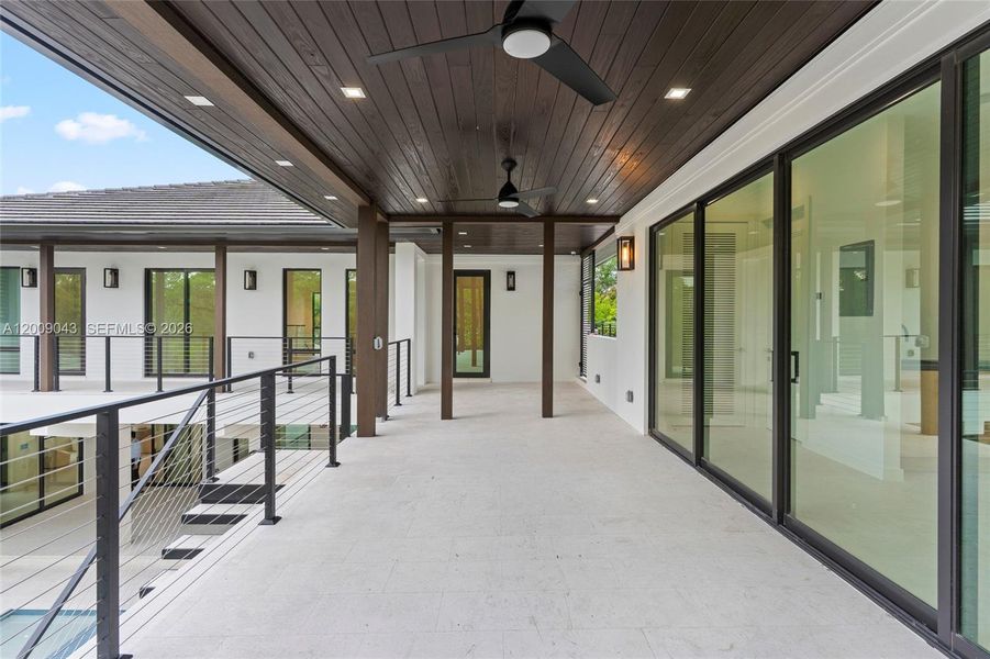 Exterior details and patio area of a home in , Coral Gables (Image 25).