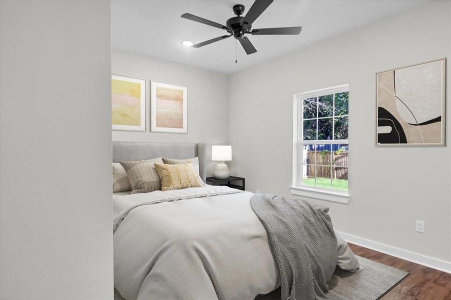 Bedroom featuring dark wood-style flooring, recessed lighting, and a ceiling fan