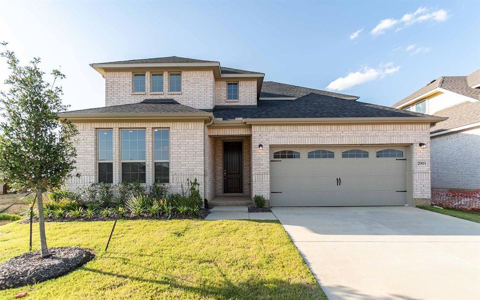 Front exterior of a new home in La Terra, Celina, TX, highlighting curb appeal (Image 1).