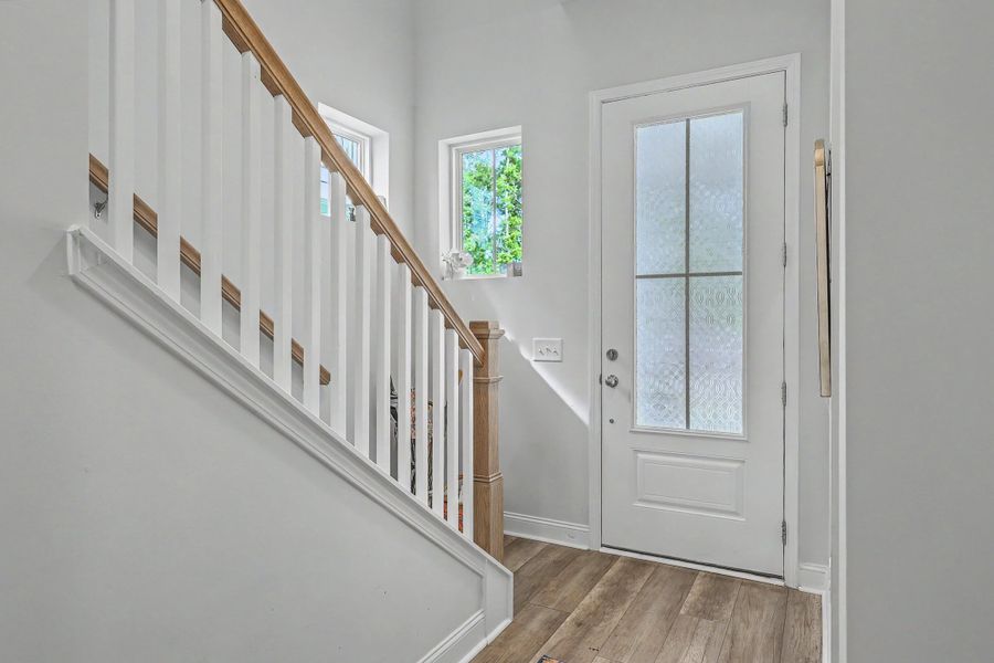 Spacious, unfurnished interior of a new home in Limehouse Village: Row Collection, Summerville (Image 24).
