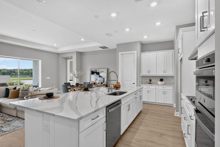 Representative furnished interior of a home built from the Ambra by Taylor Morrison in Center Lake Ranch Community Group Page, St. Cloud (Image 7).