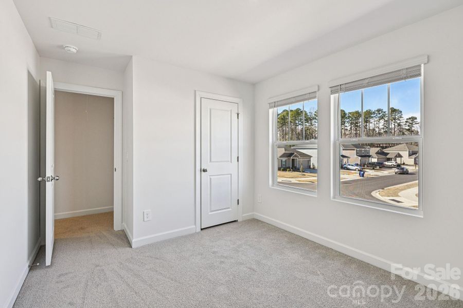 Spacious, unfurnished interior of a new home in Harper Landing, Stanley (Image 19).