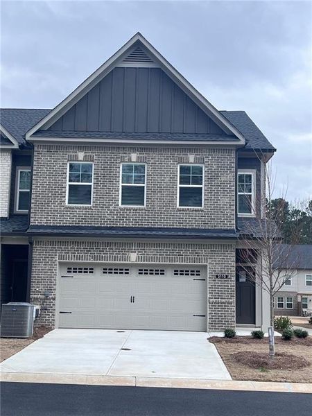 Front exterior of a new home in Governors Parc, Kennesaw, GA, highlighting curb appeal (Image 1). Front exterior of a new home in Governors Parc, Kennesaw, GA, highlighting curb appeal (Image 1).