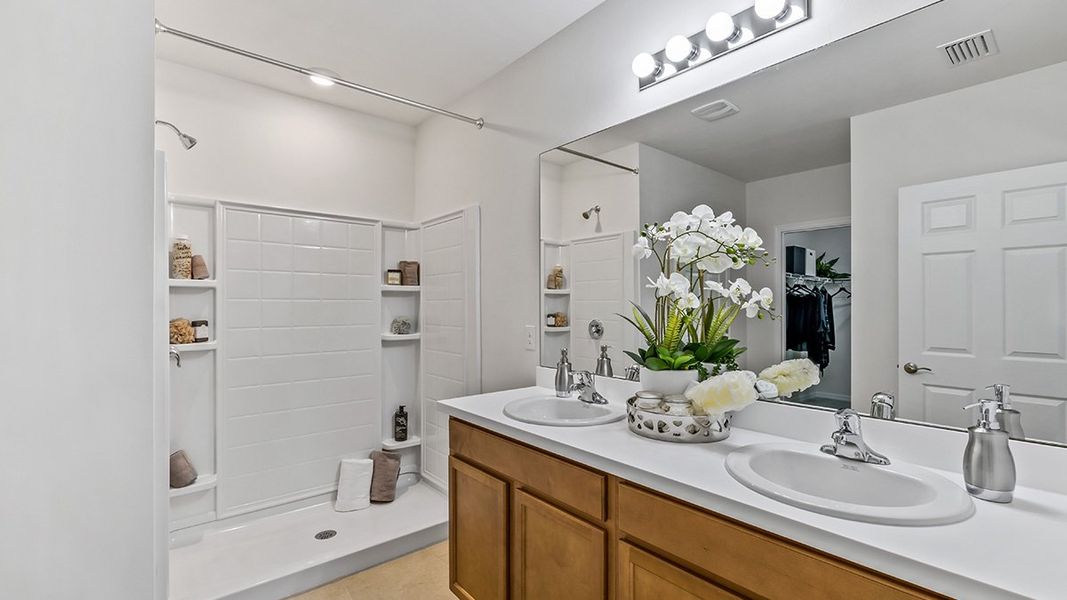 Representative furnished interior of a home built from the Cali by D.R. Horton in North Port - Express Series, North Port (Image 14).