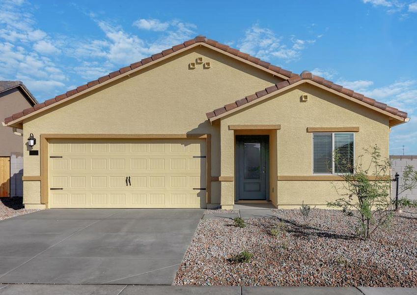 This home has a covered porch and professional landscaping.