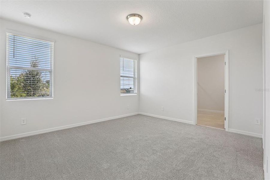 Spacious, unfurnished interior of a new home in Crosswinds - Signature Series, Haines City (Image 27).