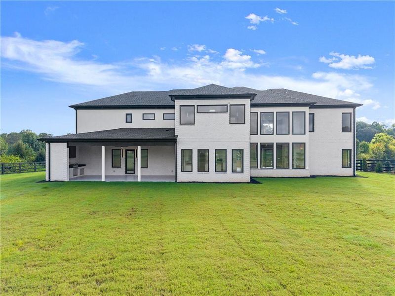 Front exterior of a new home in , Dacula, GA, highlighting curb appeal (Image 2).