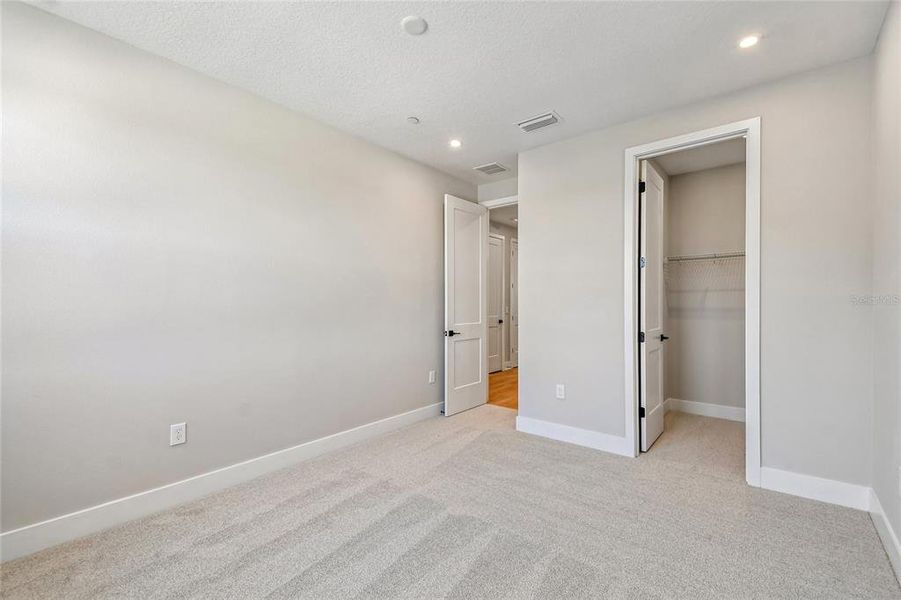 Spacious, unfurnished interior of a new home in EvenTide, New Smyrna Beach (Image 15).