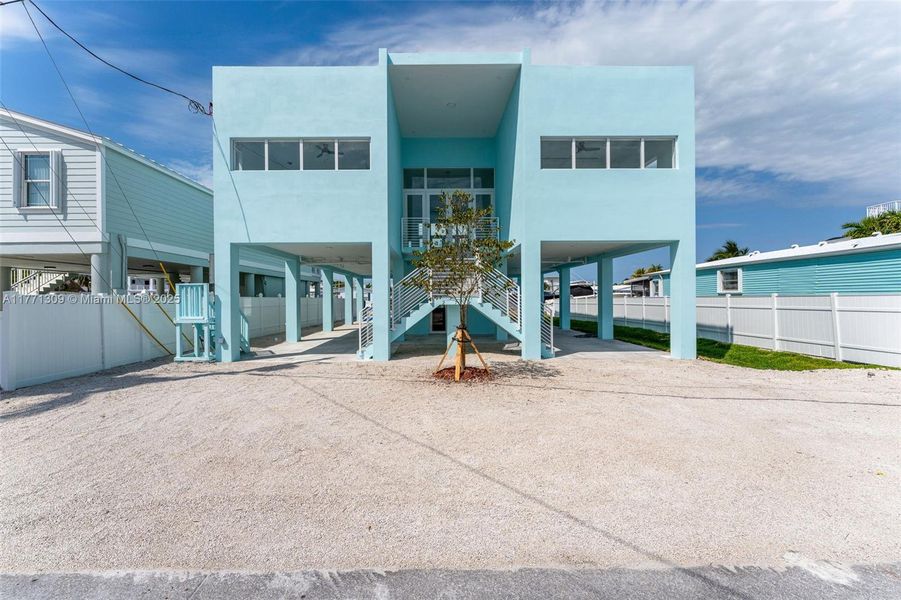 Front exterior of a new home in , Key Largo, FL, highlighting curb appeal (Image 25).