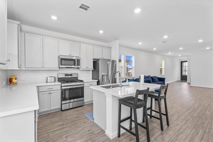 Furnished interior view inside a new home in Mason Woods, Cypress (Image 9).