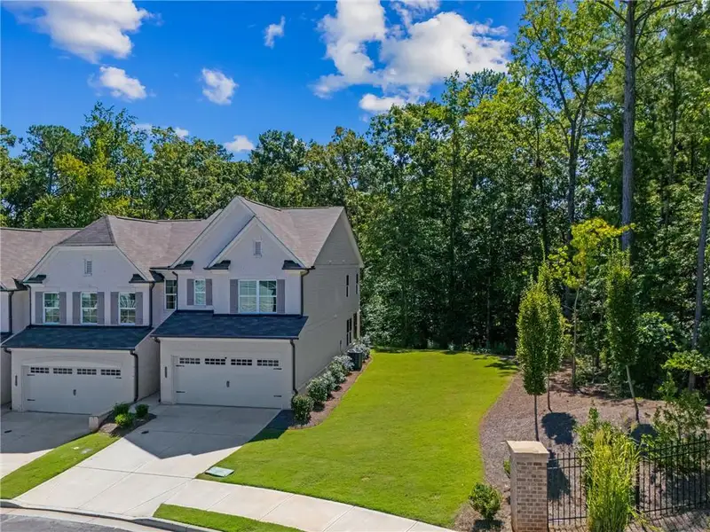Front exterior of a new home in , Duluth, GA, highlighting curb appeal (Image 29). Front exterior of a new home in , Duluth, GA, highlighting curb appeal (Image 29).