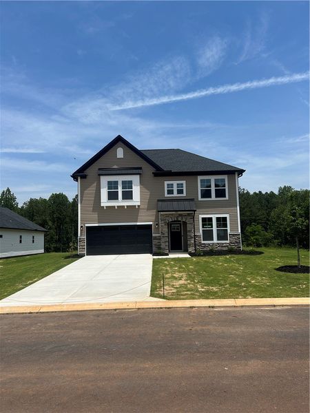 A newly built residence with a two-story design an A newly built residence with a two-story design an