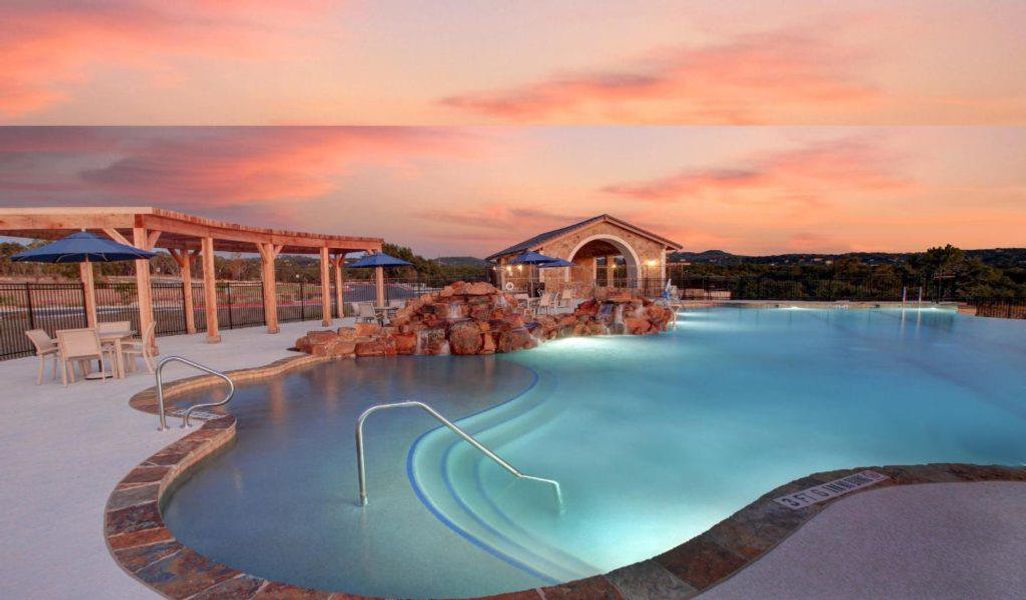 Community pool with a patio area Community pool with a patio area