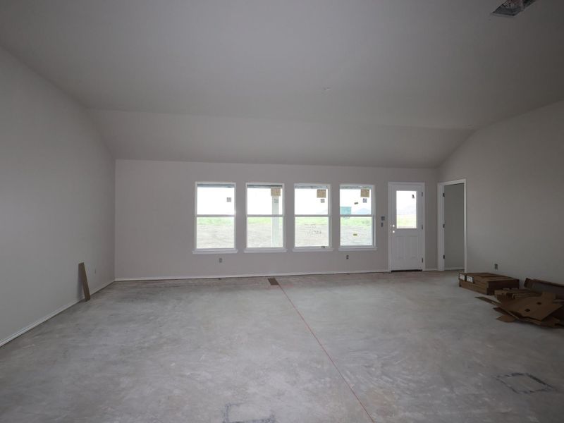 In-progress construction of a new home in Carillon, Manor, TX (Image 9).