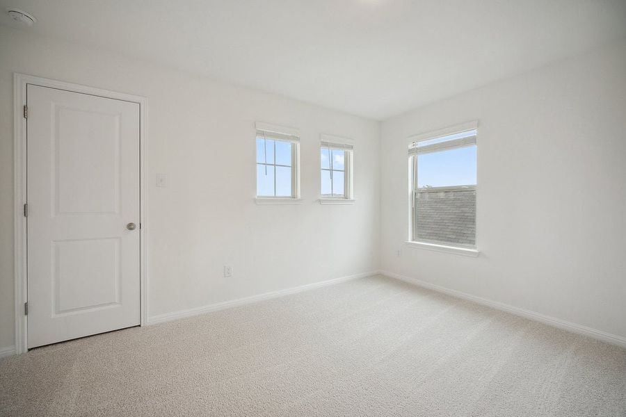 Spacious, unfurnished interior of a new home in The Hills of Bear Creek, Manchaca (Image 33).