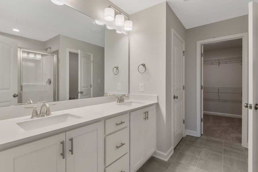 Representative furnished interior of a home built from the Magnolia by Caviness & Cates Communities in Bartlett Manor, Youngsville (Image 216).