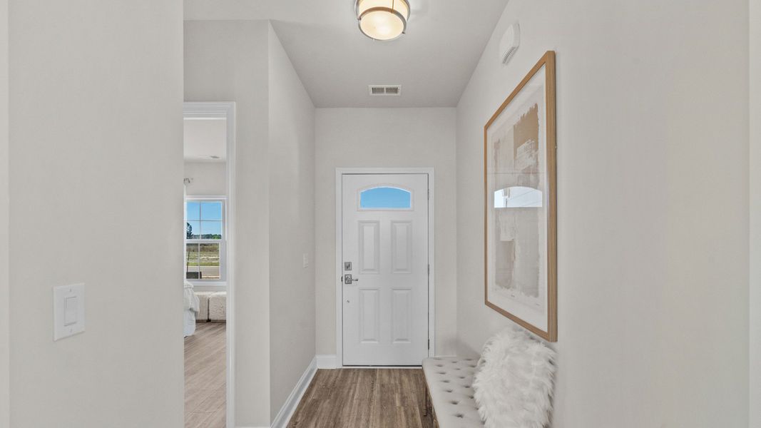 Representative unfurnished interior of a home built from the Capri IV by Epcon Communities in Courtyards by Carrell, Ocean Isle Beach (Image 22). Representative unfurnished interior of a home built from the Capri IV by Epcon Communities in Courtyards by Carrell, Ocean Isle Beach (Image 22).