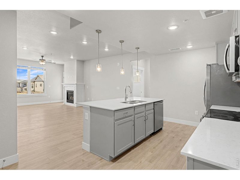 Furnished interior view inside a new home in Highlands at Fox Hill - The Flats, Longmont (Image 9).