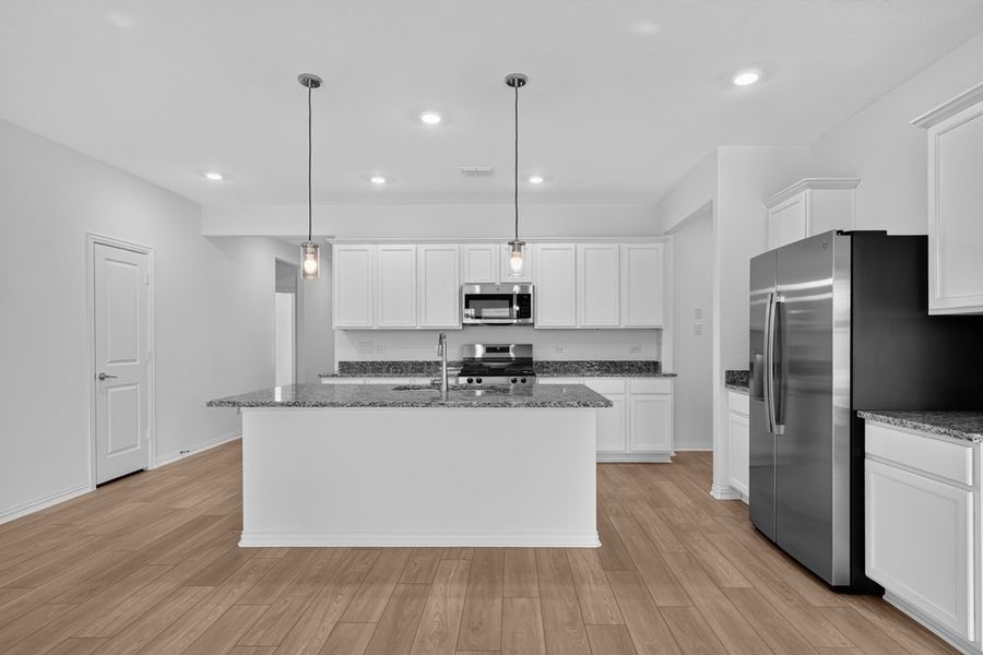 Furnished interior view inside a new home in River Ridge, Crandall (Image 4).