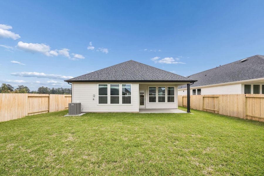 Exterior details and patio area of a home in Montgomery Bend, Montgomery (Image 3).