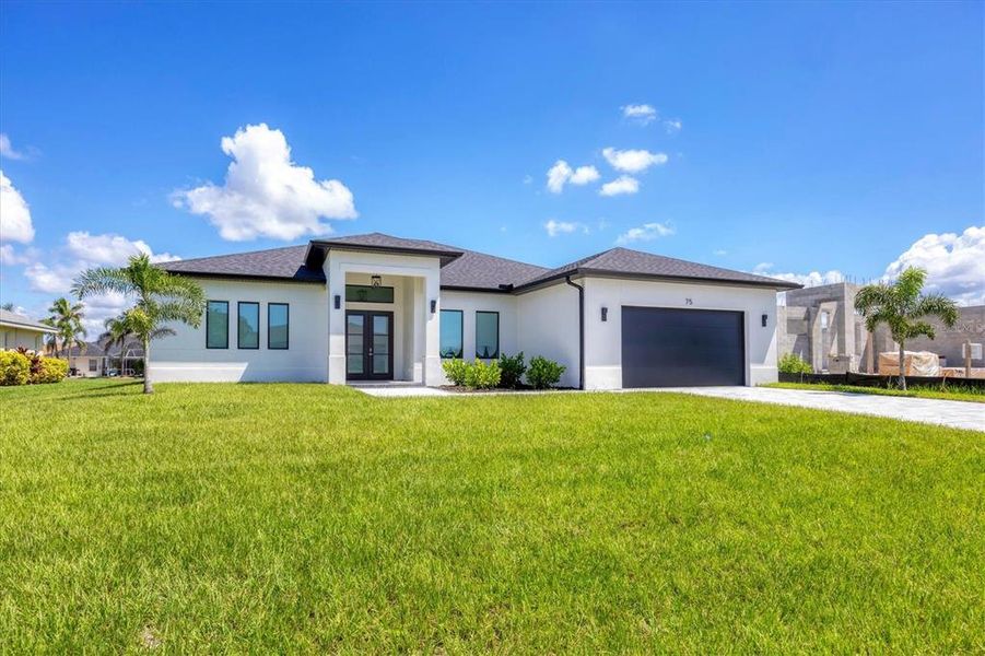 Front exterior of a new home in , Rotonda West, FL, highlighting curb appeal (Image 22).