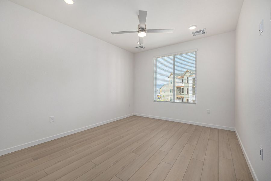 Spacious, unfurnished interior of a new home in The Residences at Victory Ridge, Colorado Springs (Image 12).