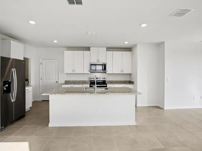 Furnished interior view inside a new home in Magnolia Bay - Premier Series, Nokomis (Image 2).
