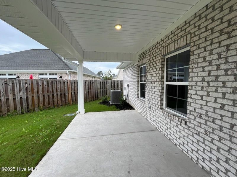 Exterior details and patio area of a home in Palmetto Creek, Bolivia (Image 2).