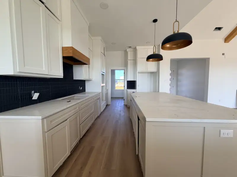 Furnished interior view inside a new home in Parallel Pastures, Poolville (Image 8).