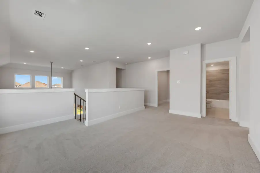 Spacious, unfurnished interior of a new home in The Meadows, Denton (Image 21).