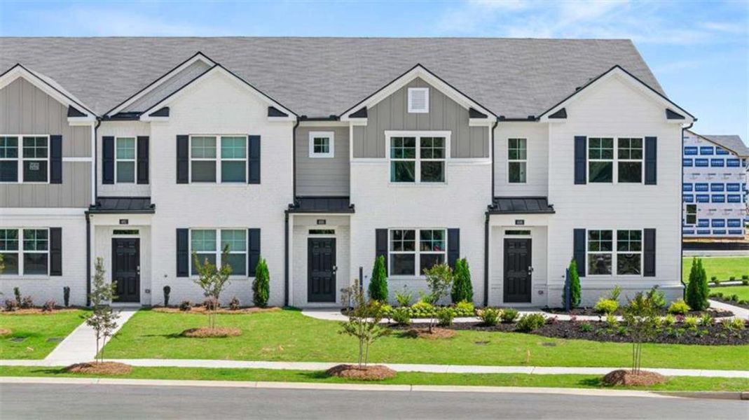 Front exterior of a new home in , Stockbridge, GA, highlighting curb appeal (Image 29).