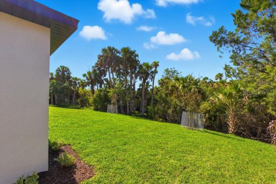 Exterior details and patio area of a home in , Palm Coast (Image 32).