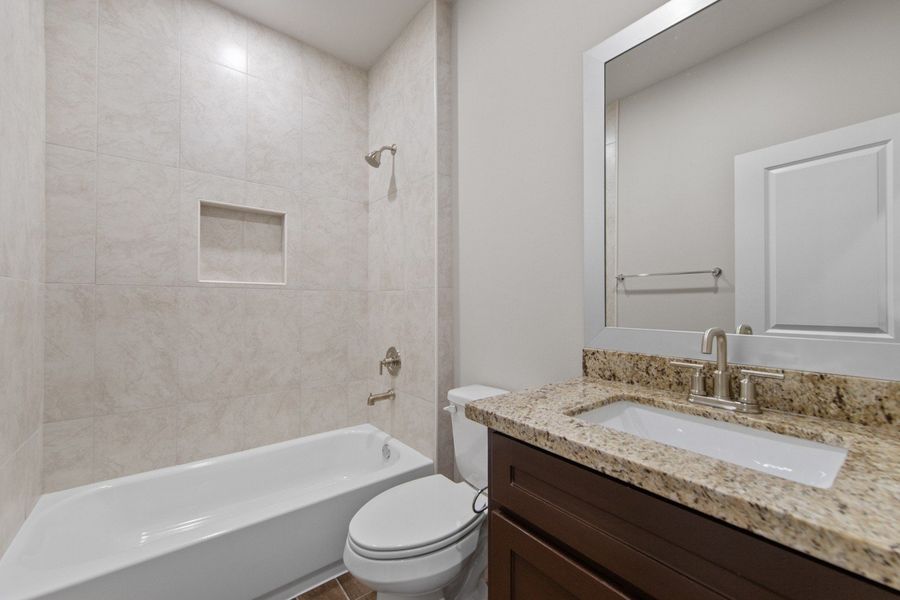 Representative furnished interior of a home built from the Clovis by Hakes Brothers in Monte Cielo, Weslaco (Image 6).