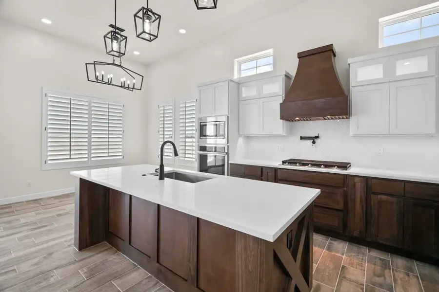 Representative furnished interior of a home built from the Scottsdale by LEH. Homes in Verdancia, El Paso (Image 42).