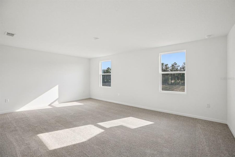Spacious, unfurnished interior of a new home in Northlake at Ovation, Winter Garden (Image 29).