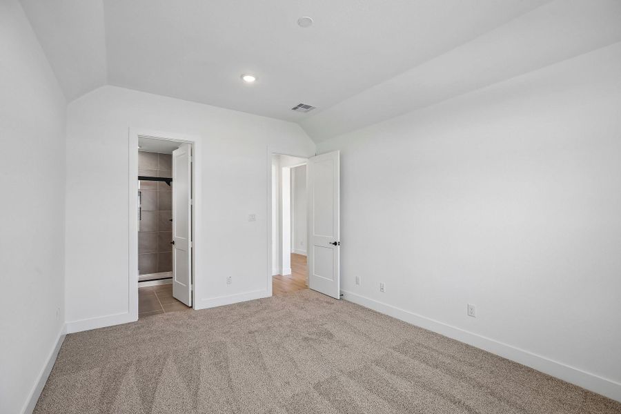 Spacious, unfurnished interior of a new home in Riceland 60',65',70', Old River-Winfree (Image 31).
